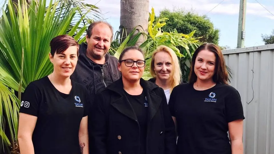 The Taylan crew in their black uniform shirts