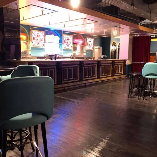 A bar with its floor gleaming after a clean